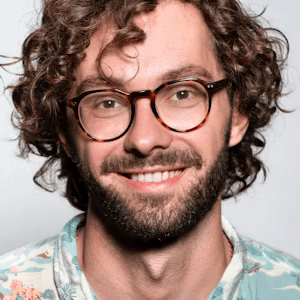 Man in glasses smiling